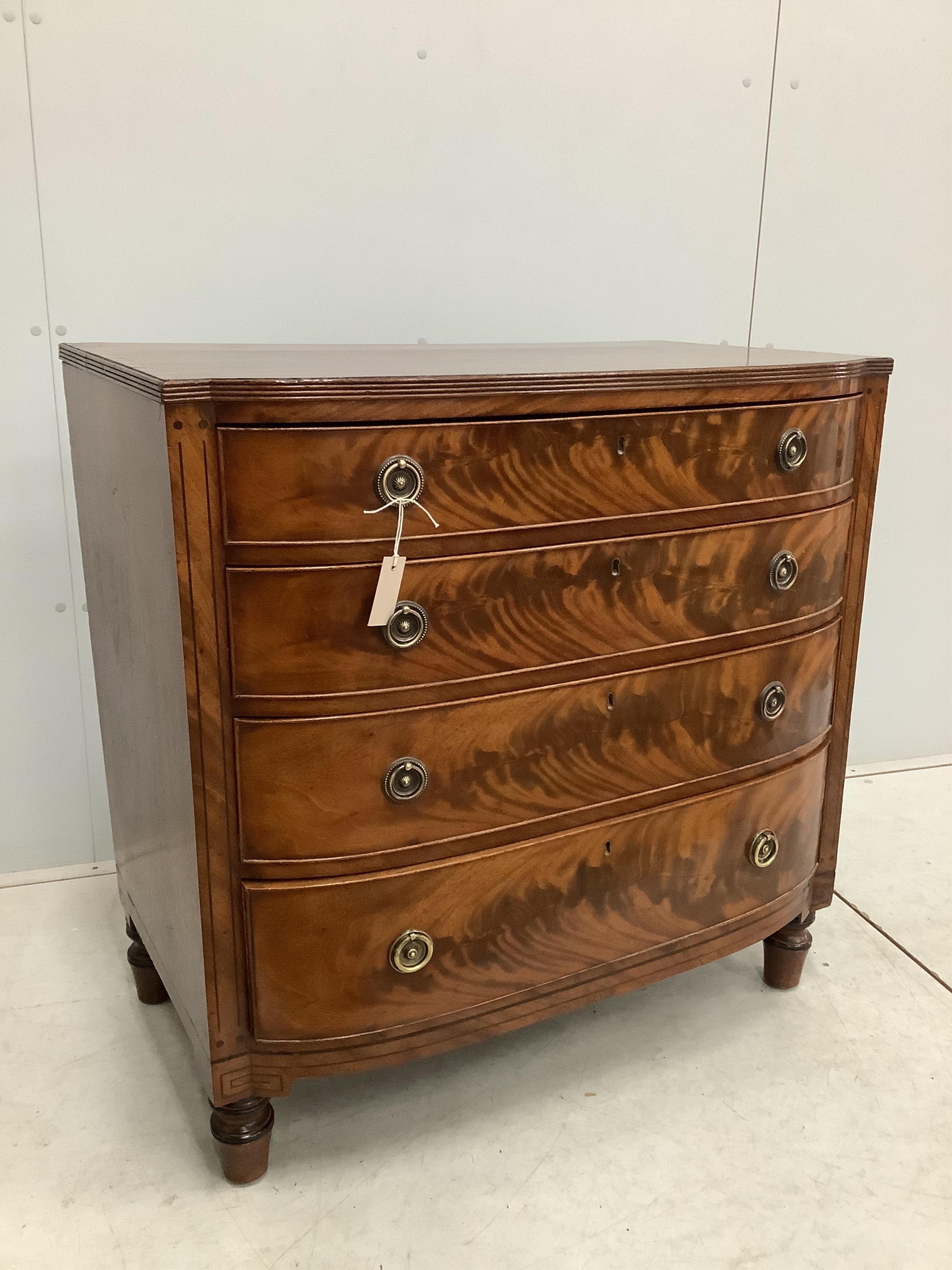 A Regency rosewood banded mahogany bow front chest, width 92cm, depth 54cm, height 91cm. Condition - fair